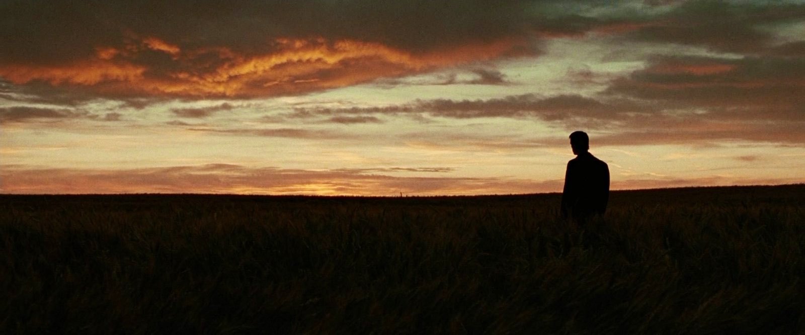 Cinematic wide reference frames: silhouettes against dusk skies and open country.