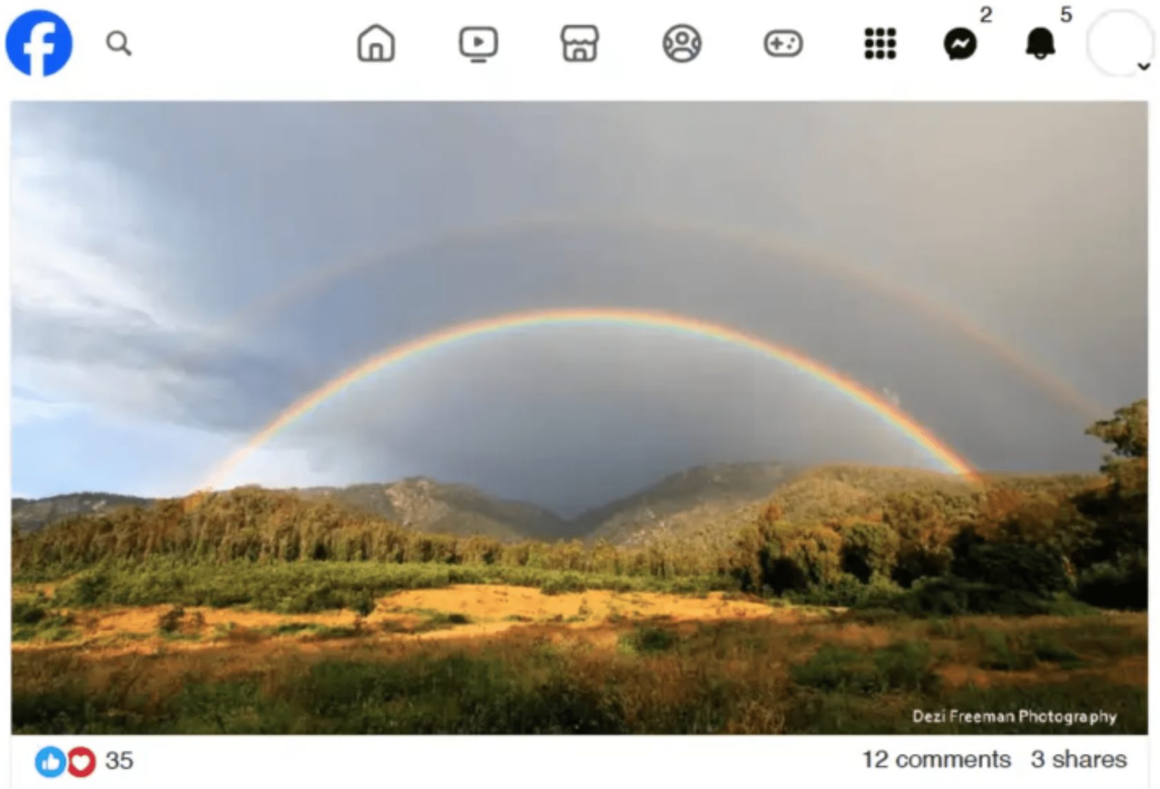 A Facebook post from Dezi Freeman Photography: a double rainbow over the Buckland Valley.